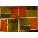 (lot of 4) A group of custom Delinear hand made Nepalese carpets designed by Chris Basia