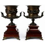 A Pair of Renaissance Revival patinated urns