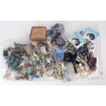 Collection of (7) bags of multi-stone, plastic wood, metal, Harajuko watches and costume jewelry