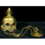 An Asian pendant glass or paste mounted and reticulated brass lantern