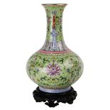 A Chinese Lime Green-Ground Famille Rose 'Lotus' Vase, with six-character Qianlong Mark