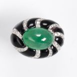 A jadeite jade, onyx, diamond and eighteen karat white gold ring