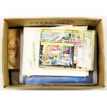 Stamp and currency group of mostly U.S. mint panes and souvenir sheets