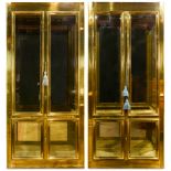 A pair of Mastercraft style brass mounted display cabinets