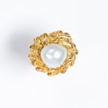A baroque South Sea pearl and fourteen karat gold ring