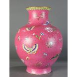 A Chinese Famille Rose pink and turquoise glazed vase