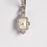 A fourteen karat white gold and diamond dress wristwatch, Hamilton