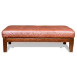 A Brown leather ottoman