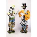 A Pair of Italian majolica Harlequin figures