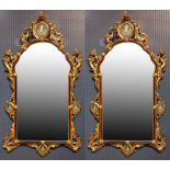 A near identical pair of Venetian giltwood mirrors, 18th century