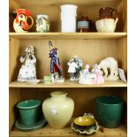 Three shelves of ceramics and earthenware decorative items