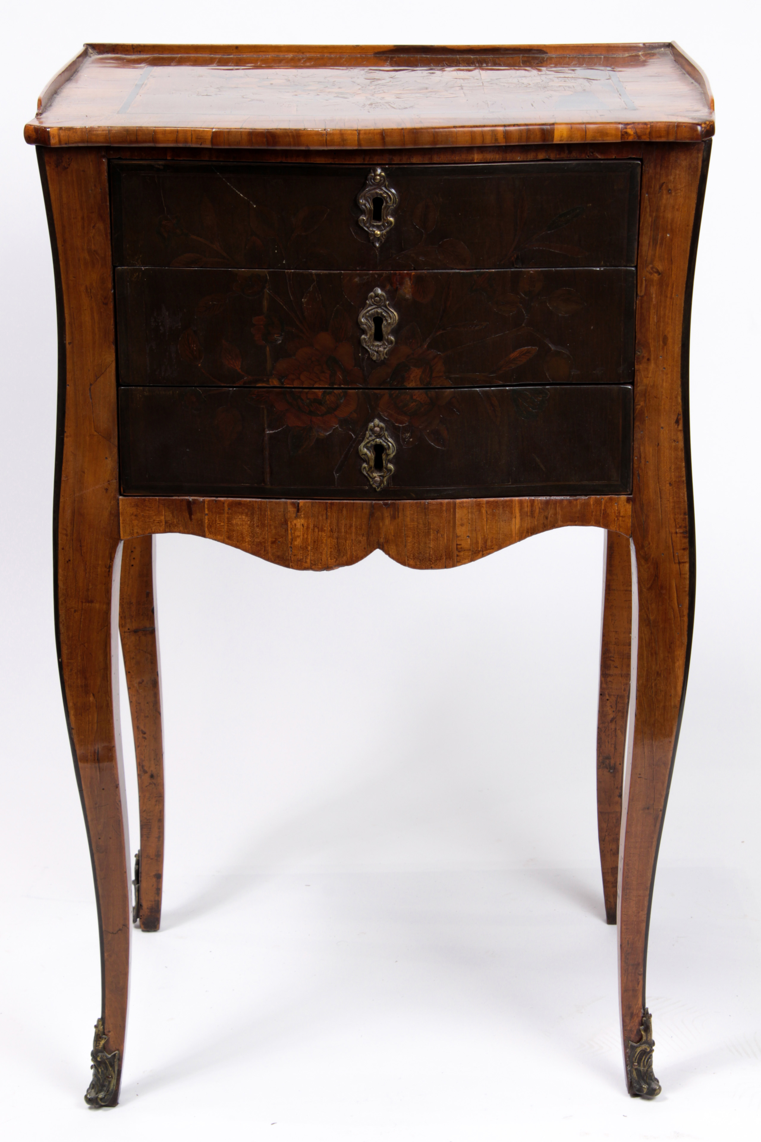 A French Provincial inlaid commode