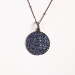A sapphire and blackened silver pendant necklace