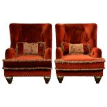 A pair of large contemporary overstuffed armchairs