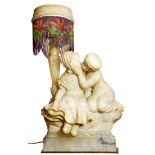 An Italian carved alabaster figural lamp circa 1920