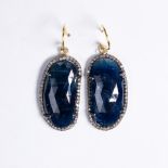 A pair of sapphire, diamond, blackened silver and eighteen karat gold earrings