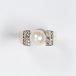 A cultured pearl, diamond and eighteen karat gold ring