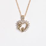 A diamond and fourteen karat gold pendant necklace