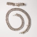 A Mexican silver necklace and bracelet suite
