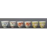 (Lot of 6) A Group of Famille Rose 'Dragon' and 'Floral' Cups, with Tongzhi Marks