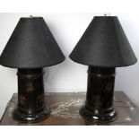Pair of ebonized papier mache drum form lamps