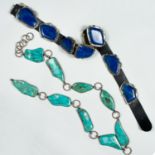 A group of turquoise or lapis and silver belts