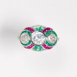 A diamond, emerald, ruby and platinum ring