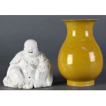 A Dehua Porcelain Figure of Budai and A Yellow-Glazed Pear-Shaped Vase