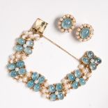An aquamarine, pearl and fourteen karat gold earclip and bracelet suite