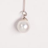 A South Sea pearl and fourteen karat white gold pendant necklace
