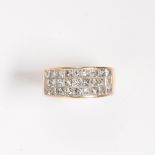 A diamond and fourteen karat gold ring