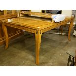 A Stanley Capri maple dining table with 2 leaves