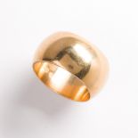 An eighteen karat gold band ring