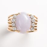 A lavender jade, diamond and fourteen karat gold ring