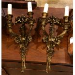A pair of Neoclassical style gilt wall sconces
