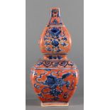 A Chinese iron red and underglaze blue vase