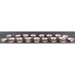 (Lot of 14) A Group of Famille Rose Sgraffiato Ruby-Ground Bowls and Plates