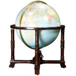 A Replogle Diplomat 32" antique ocean illuminated floor globe on stand