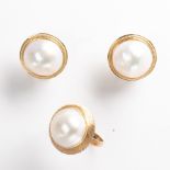 A pair of mabe pearl and fourteen karat gold earclips and ring