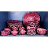 One shelf of Metlox "Lotus by Poppytrail" plum china service