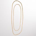 A pair of fourteen karat gold chain necklaces