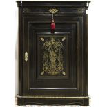 A French Napoleon III ebonized and brass inlaid hall cabinet