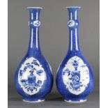 (Lot of 2) Pair of Blue and White Blue-Ground Garlic-Head Bottle Vases
