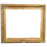 A Newcomb Macklin Barbizon style carved giltwood frame