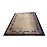 Chinese ivory ground carpet with cobalt blue border