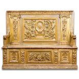 An Italian Baroque style paint and parcel gilt caspanca