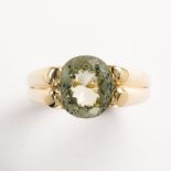 A tourmaline and fourteen karat gold ring