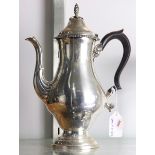 Genova sterling footed teapot fitted with a wood handle