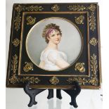 A Continental porcelain plaque depicting a young beauty
