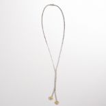 A colorless and yellow diamond eighteen karat gold lariat necklace